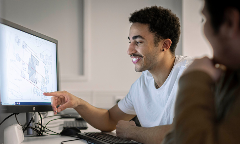A student working on design software in the Architectural Studio.