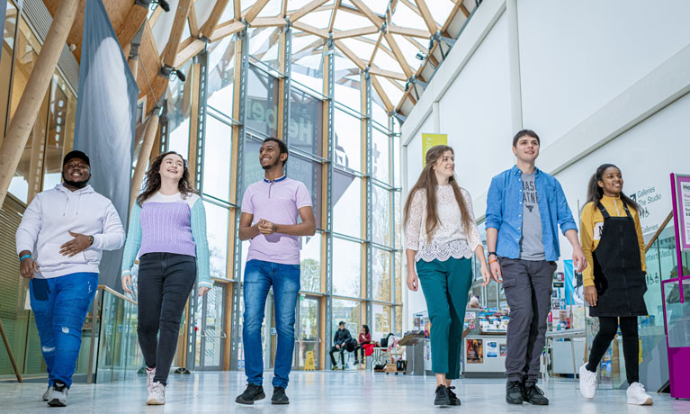 A group of students walking into the Herbert Art Gallery