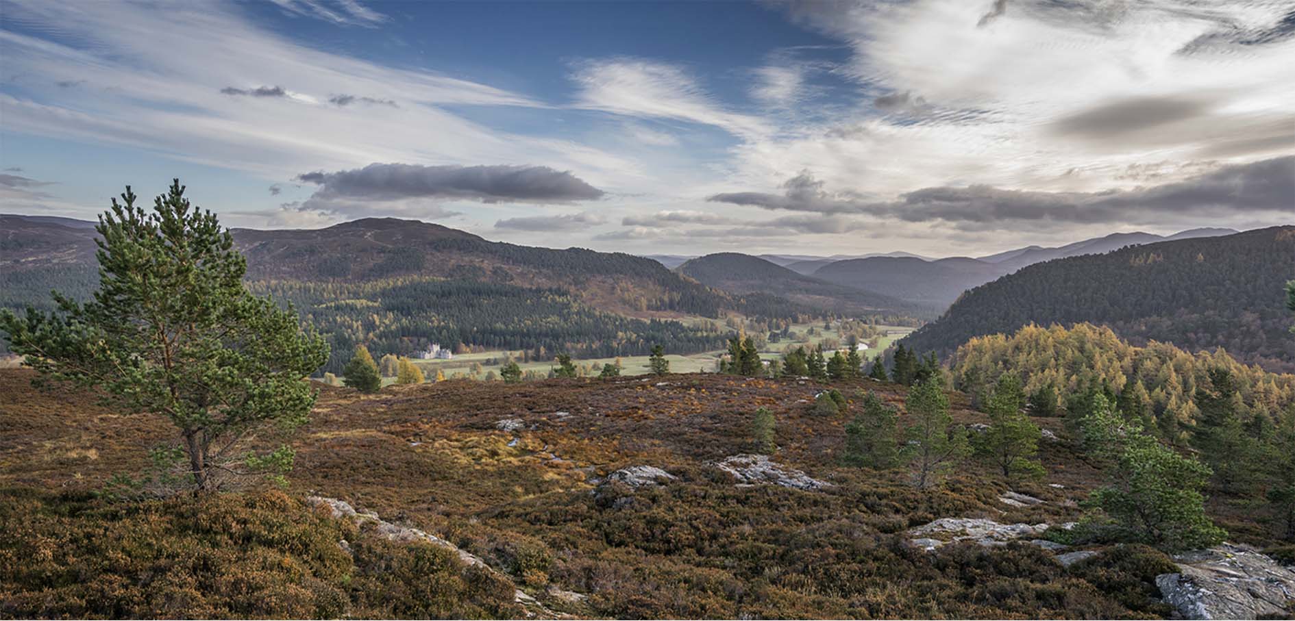 A cloudy, mountain landscape of the Cairngorms National park