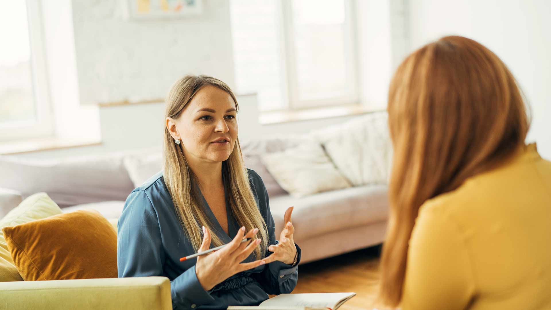Two women in discussion 