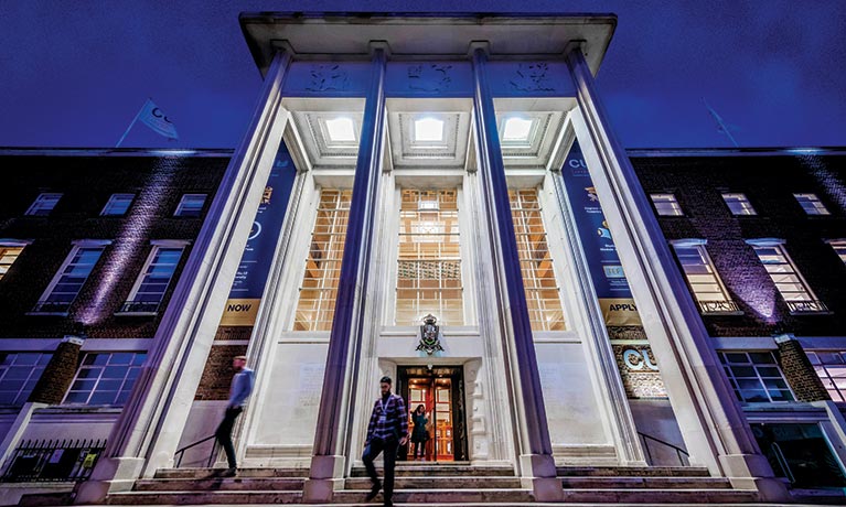 Outside of the Dagenham building at night